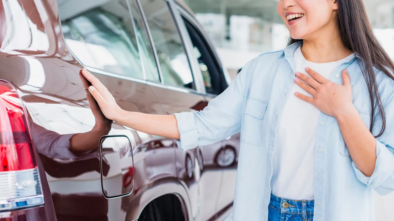 happy-woman-car-dealership_23-21
